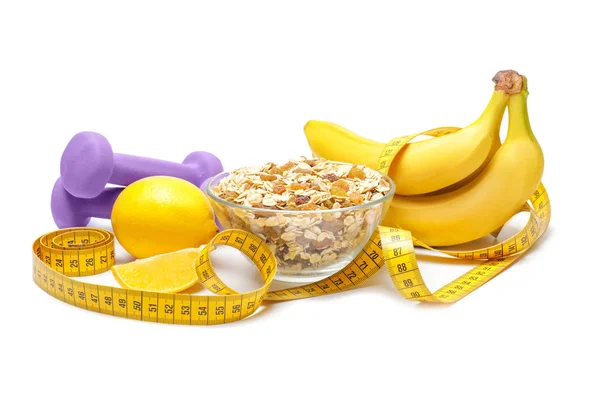 Different healthy food with measuring tape and dumbbells on white background. Diet concept — Stok fotoğraf