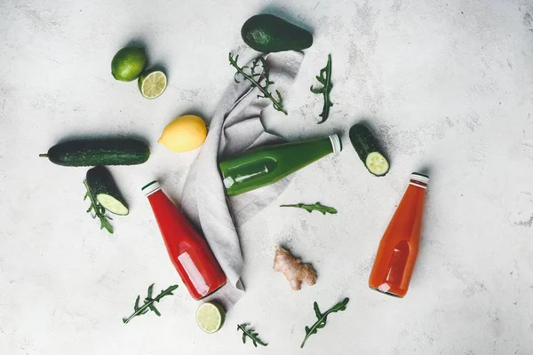 Bottles of fresh vegetable juices on white background — Stock Photo, Image