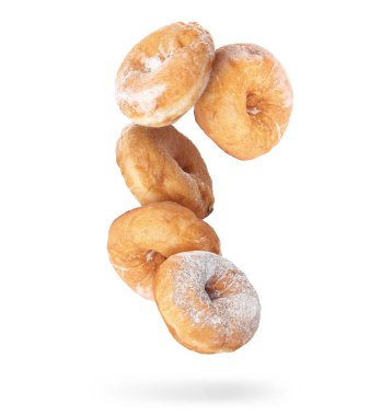 Beyaz arka planda uçan tatlı çörekler