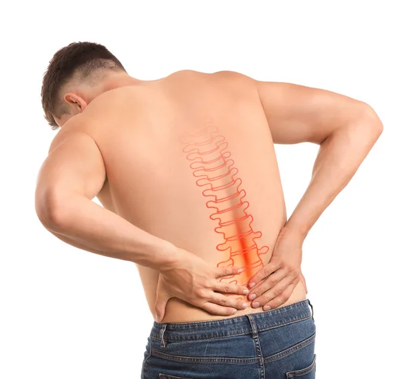 Young man suffering from back pain on white background — Stock Photo, Image