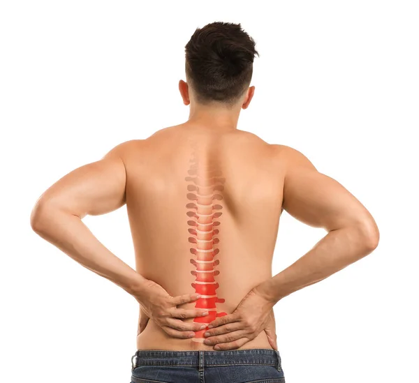 Young man suffering from back pain on white background — Stock Photo, Image