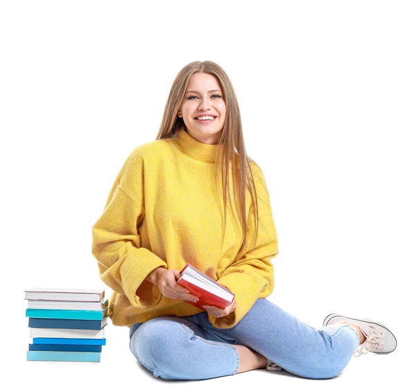 Belle jeune femme avec des livres sur fond blanc — Photo