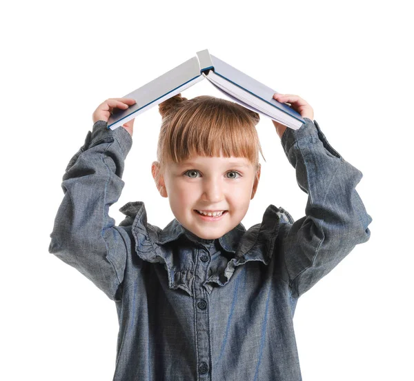 Nettes kleines Mädchen mit Buch auf weißem Hintergrund — Stockfoto