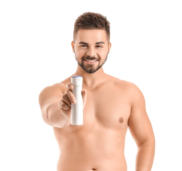 Beau jeune homme avec déodorant sur fond blanc — Photo