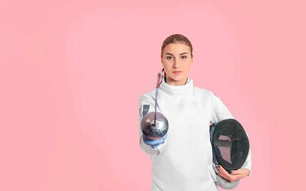 Young female fencer on color background — Stock Photo, Image