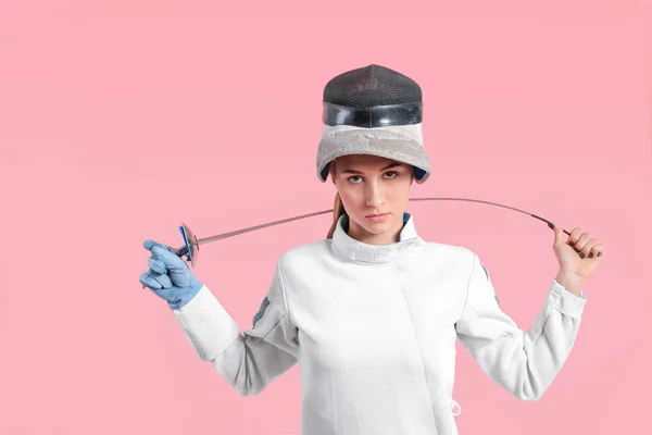 Young female fencer on color background — Stock Photo, Image