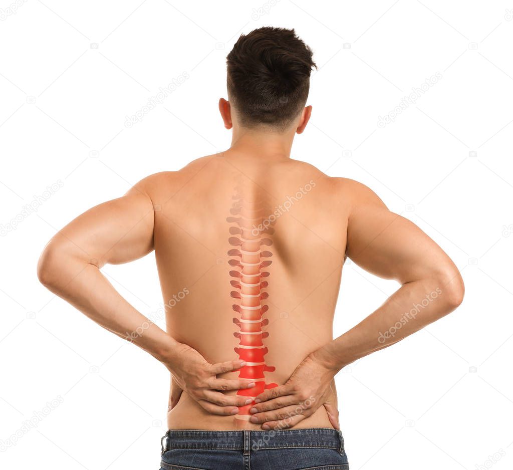 Young man suffering from back pain on white background