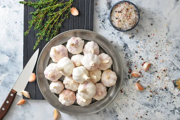 Fresh garlic with spices and herbs on white background — Stock Photo, Image