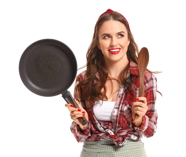 Beautiful housewife with kitchenware on white background — Stok fotoğraf