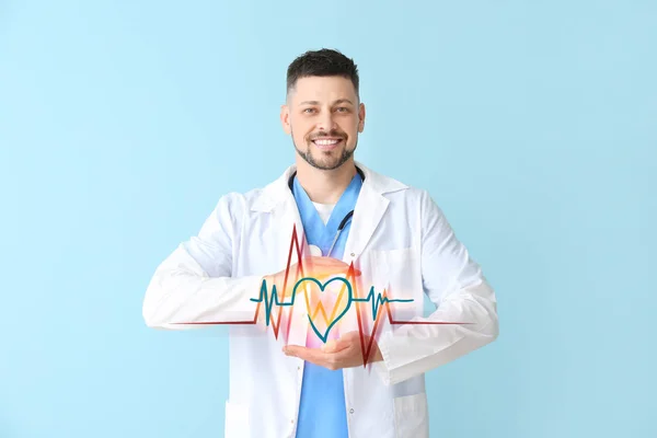 Man cardioloog met getrokken hart op kleur achtergrond — Stockfoto