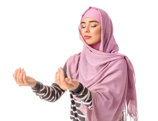 Muslim woman praying against white background — 스톡 사진