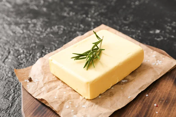 Fresh butter on wooden board, closeup — Stock Photo, Image