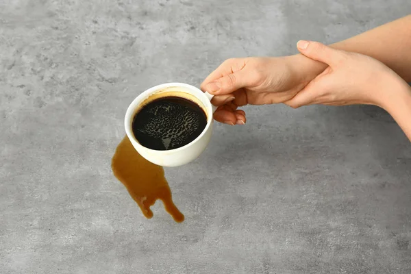 Woman suffering from Parkinson syndrome with cup of coffee — 스톡 사진