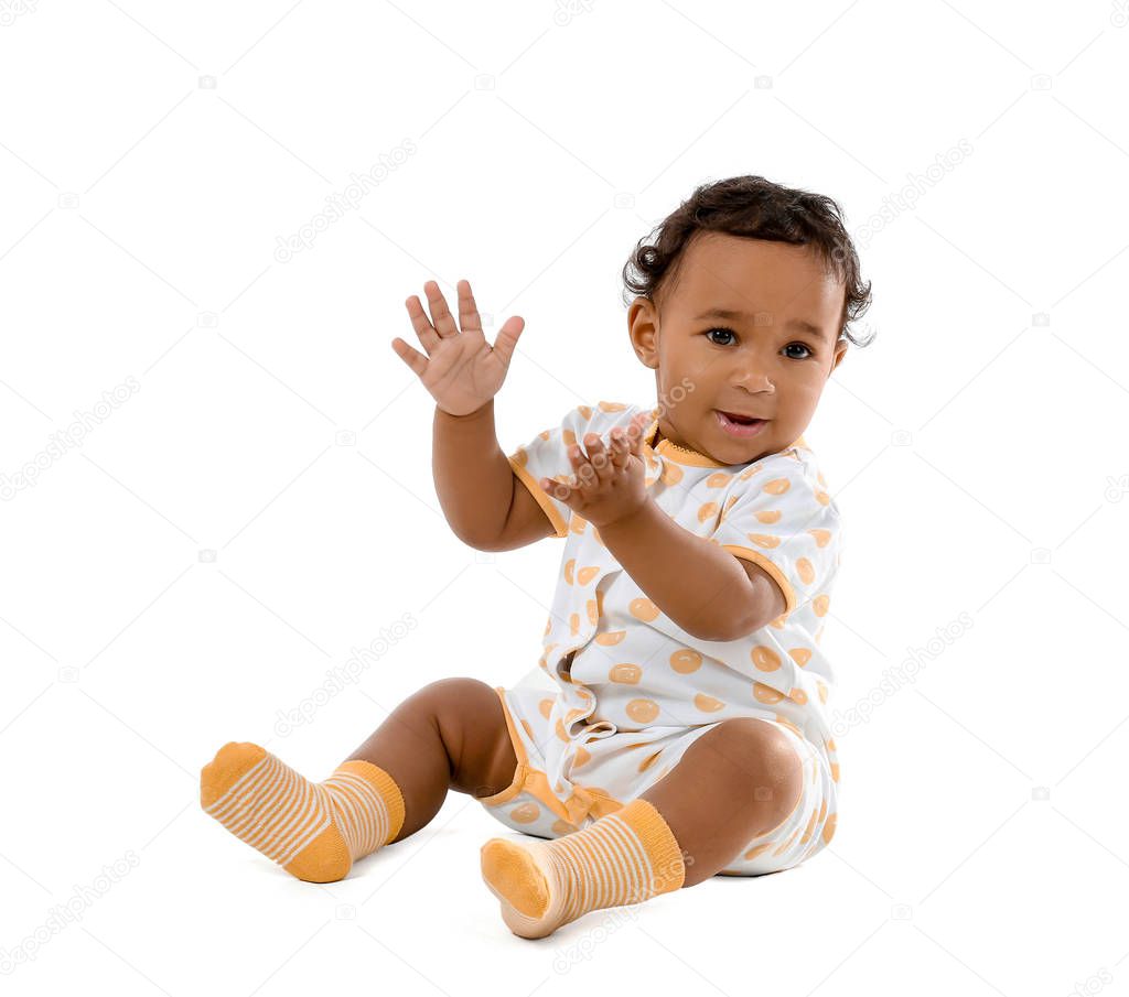 Cute African-American baby isolated on white