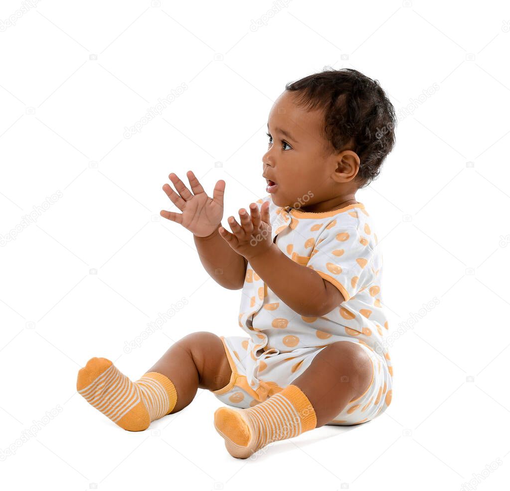 Cute African-American baby isolated on white