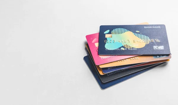 Different credit cards on light background — Stock Photo, Image