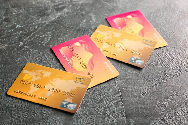 Different credit cards on dark background — Stock Photo, Image