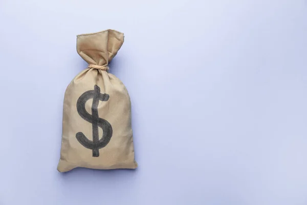 Bag with money on color background — Stock Photo, Image