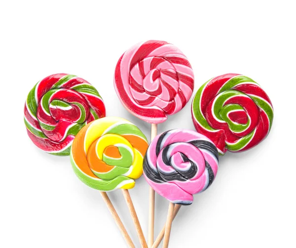 Lollipops saborosos no fundo branco — Fotografia de Stock