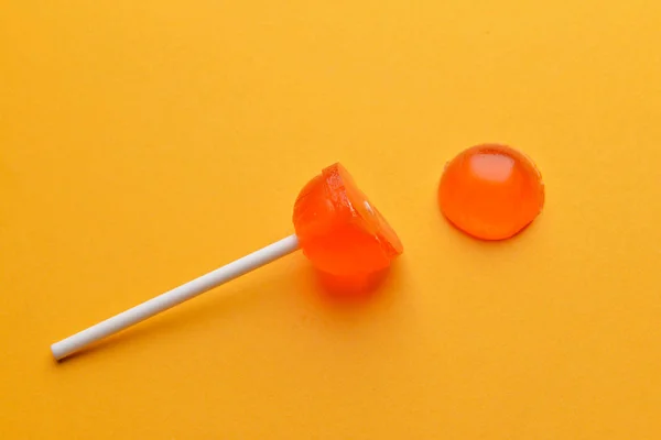 Crushed lollipop on color background — Stock Photo, Image