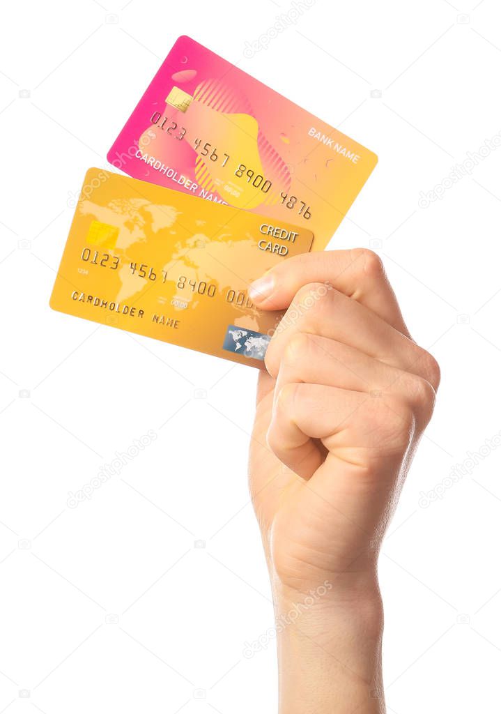 Female hand with credit cards on white background