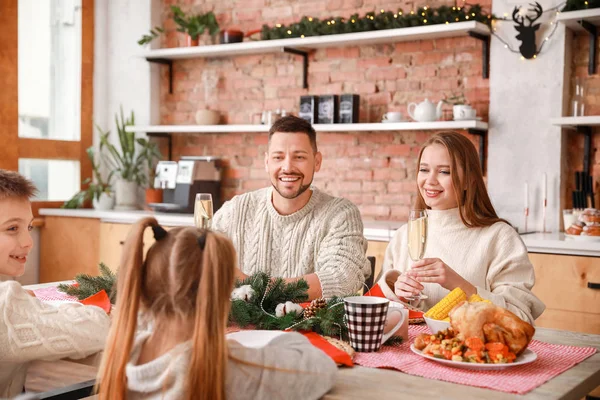 Happy family having Christmas dinner at home — Stock Photo, Image