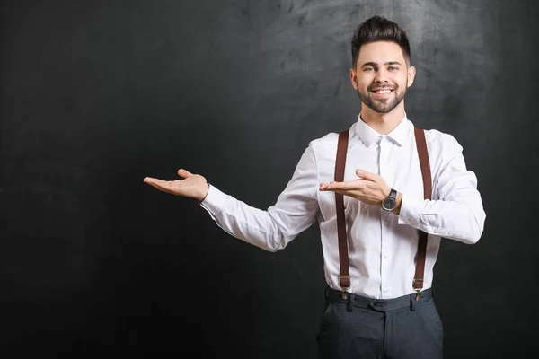 Male teacher near blackboard in classroom — Stock Photo, Image