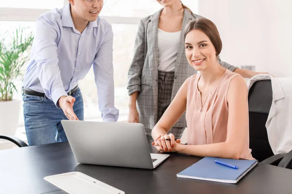 Young businesswoman during meeting in office — Stock Photo, Image