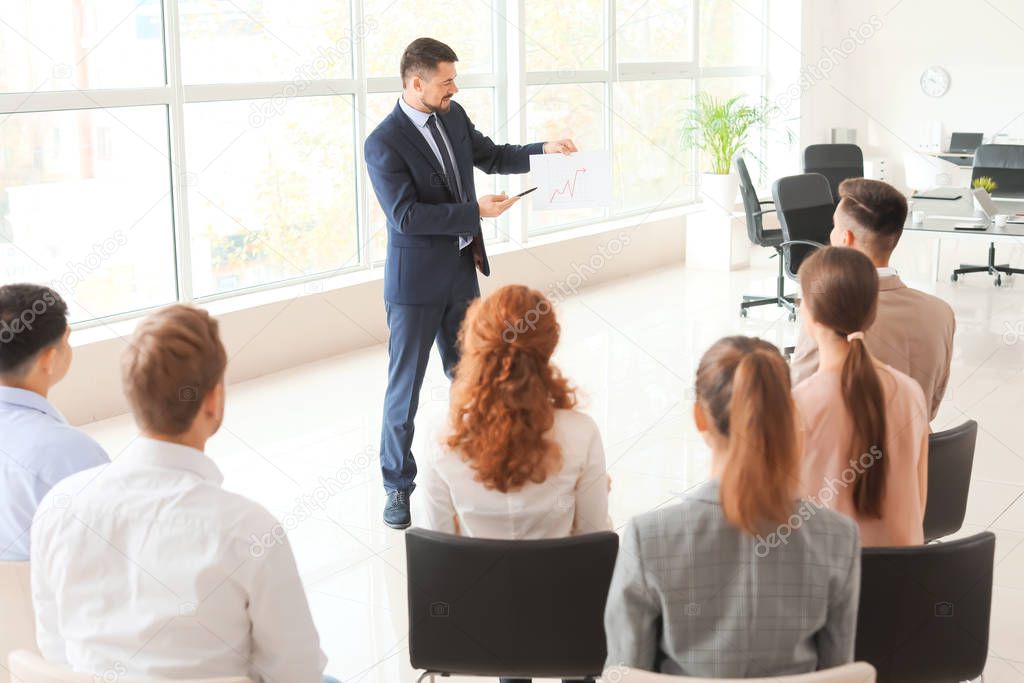 Businessman holding a meeting in office