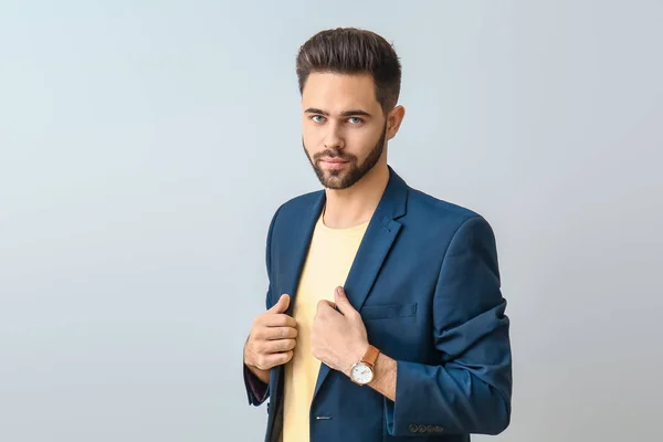 Joven guapo sobre fondo claro —  Fotos de Stock