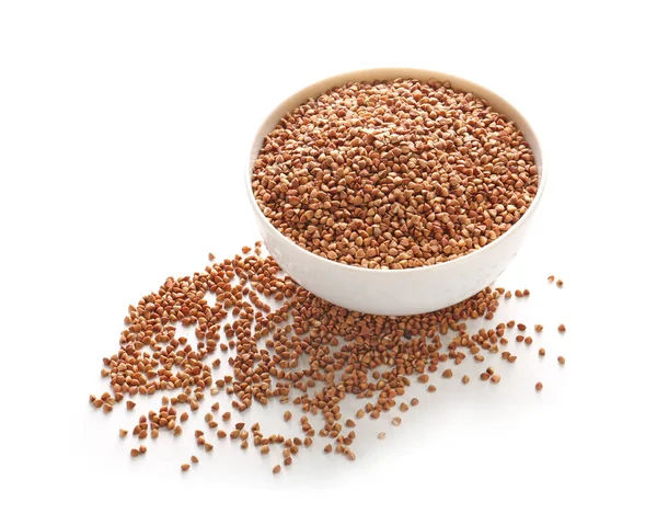 Bowl with raw buckwheat on white background — Stock Photo, Image