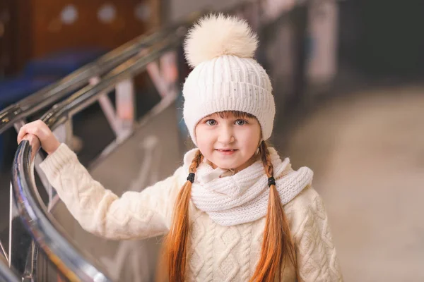 Cute little girl on skating rink — Stock Photo, Image