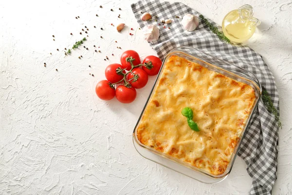 Composition with tasty baked lasagna on white background — Stock Photo, Image