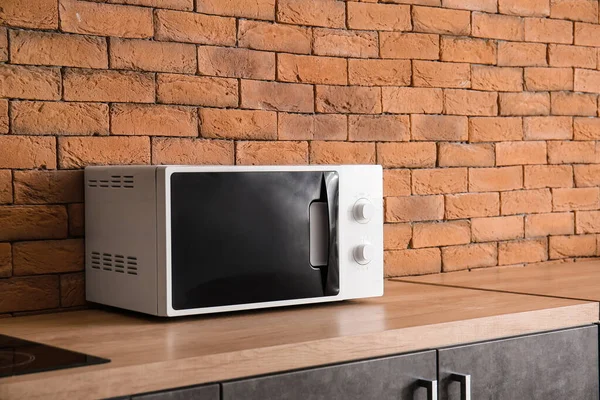 Modern microwave oven in kitchen — Stock Photo, Image