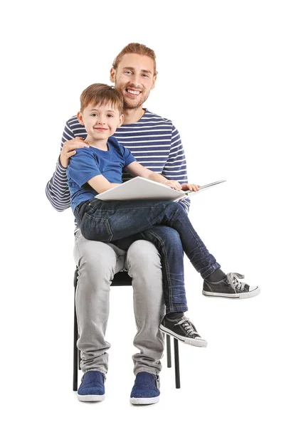Father and his little son reading books on white background — 스톡 사진