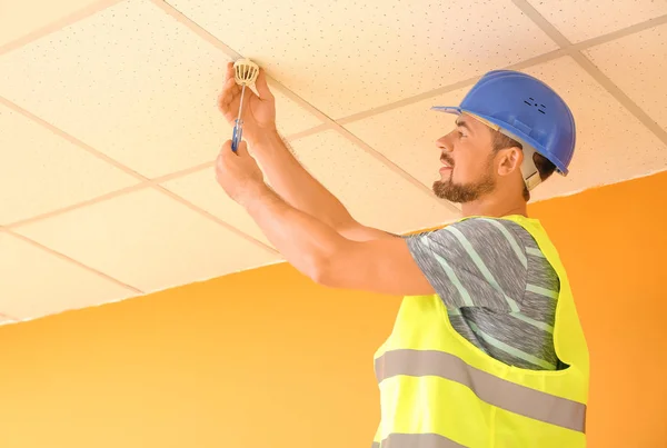 Fire safety specialist inspecting building