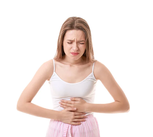 Junge Frau mit Bauchschmerzen auf weißem Hintergrund — Stockfoto