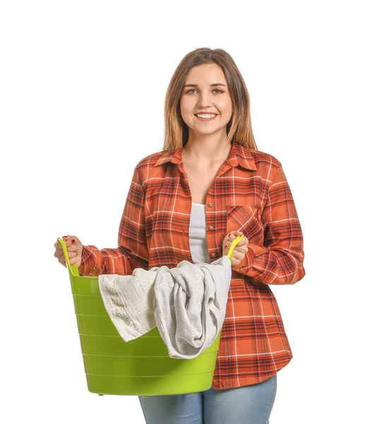 Mulher bonita com lavanderia no fundo branco — Fotografia de Stock