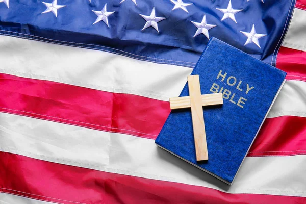 Christian cross and Bible on USA flag — Stock Photo, Image