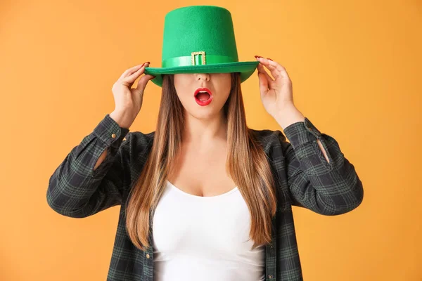 Funny young woman on color background. St. Patrick's Day celebration — 스톡 사진