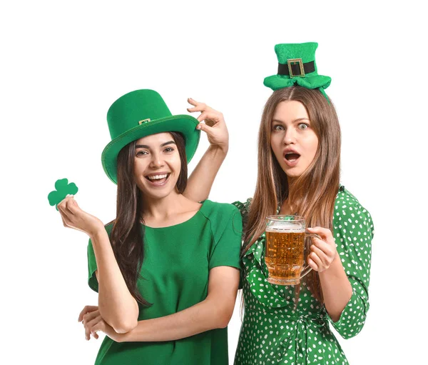 Young women with beer on white background. St. Patrick's Day celebration — Stock Photo, Image