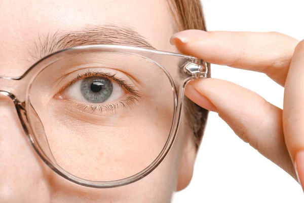 Young woman in stylish eyeglasses on white background, closeup — Stockfoto