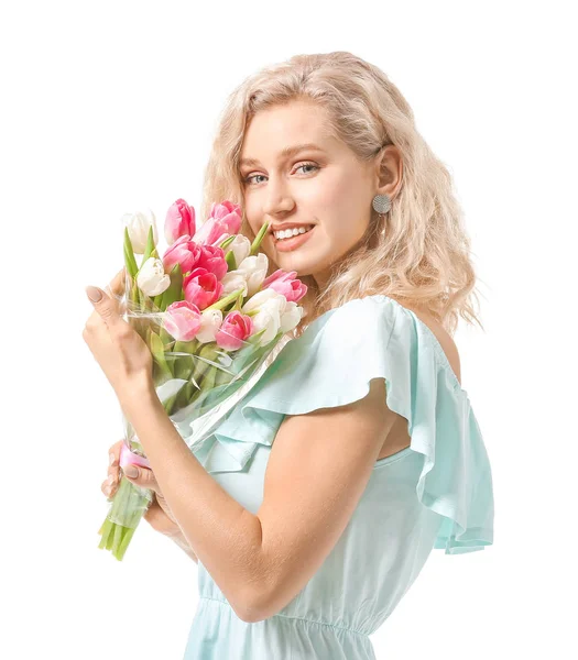 Vacker ung kvinna med blommor på vit bakgrund. Internationella kvinnodagen firas — Stockfoto