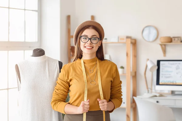 Young female tailor in atelier — Stock Photo, Image