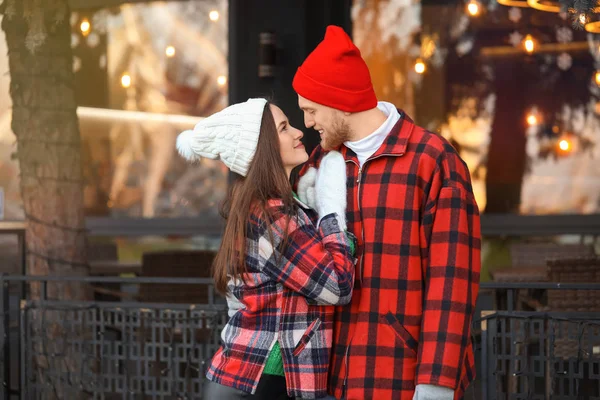 Happy young couple walking outdoors on winter day — Stock Photo, Image