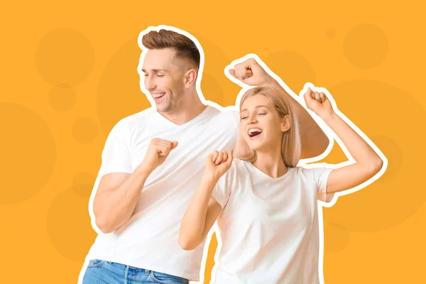 Happy dancing young couple on color background — Stock Photo, Image