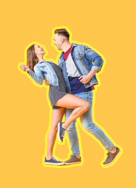 Feliz pareja joven bailando sobre fondo de color — Foto de Stock