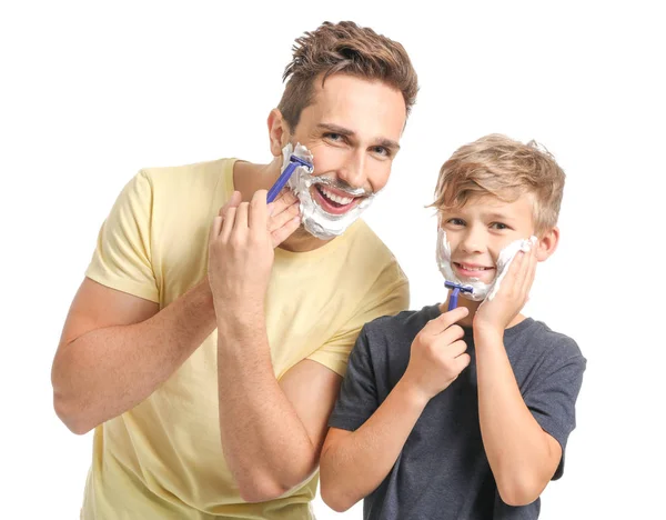 Father and his little son shaving against white background — Stok fotoğraf