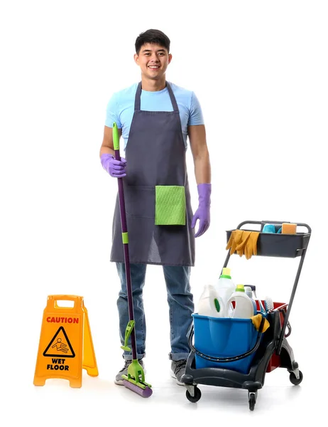 Asian janitor with cleaning supplies on white background — 스톡 사진