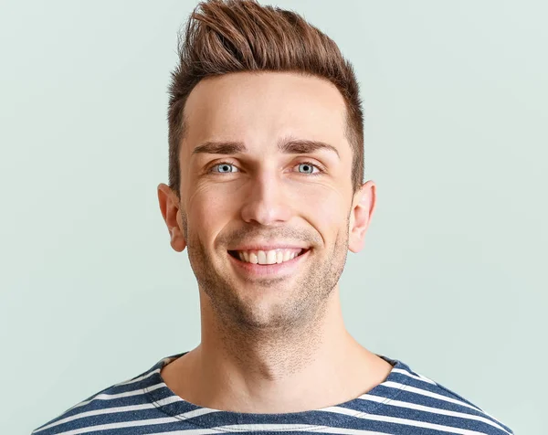 Handsome young man with healthy teeth on white background — Stock Photo, Image